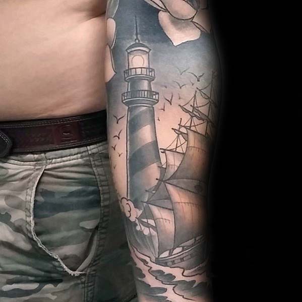 Modern Nautical Ship With Lighthouse Mens Sleeve Tattoo