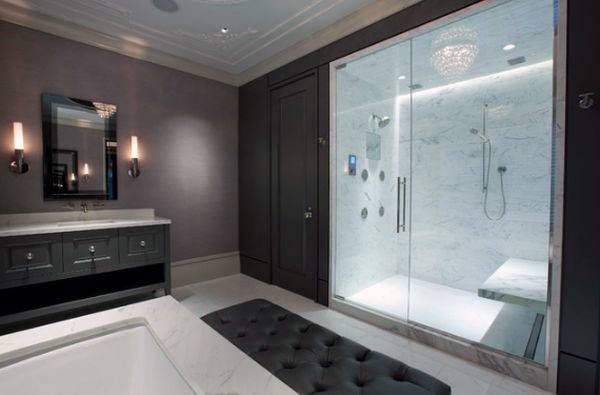 shower with marble accents and upright pendant sconces 