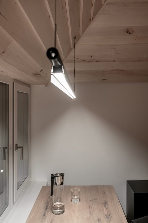 modern sloping light wood ceiling