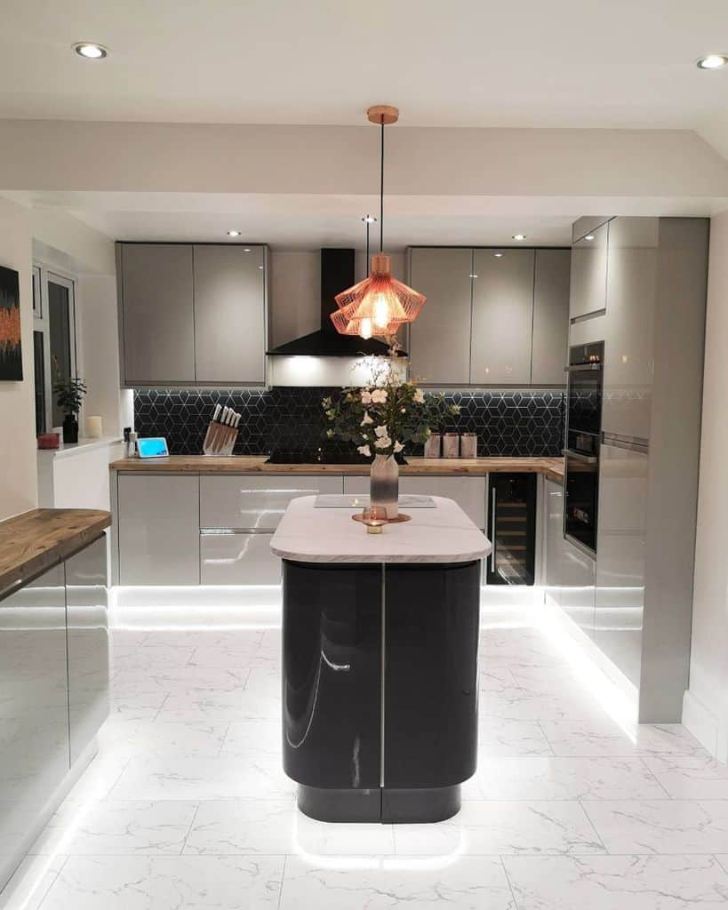 small modern kitchen with under cabinet led lighting 