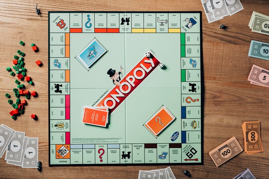 monopoly game on wooden table