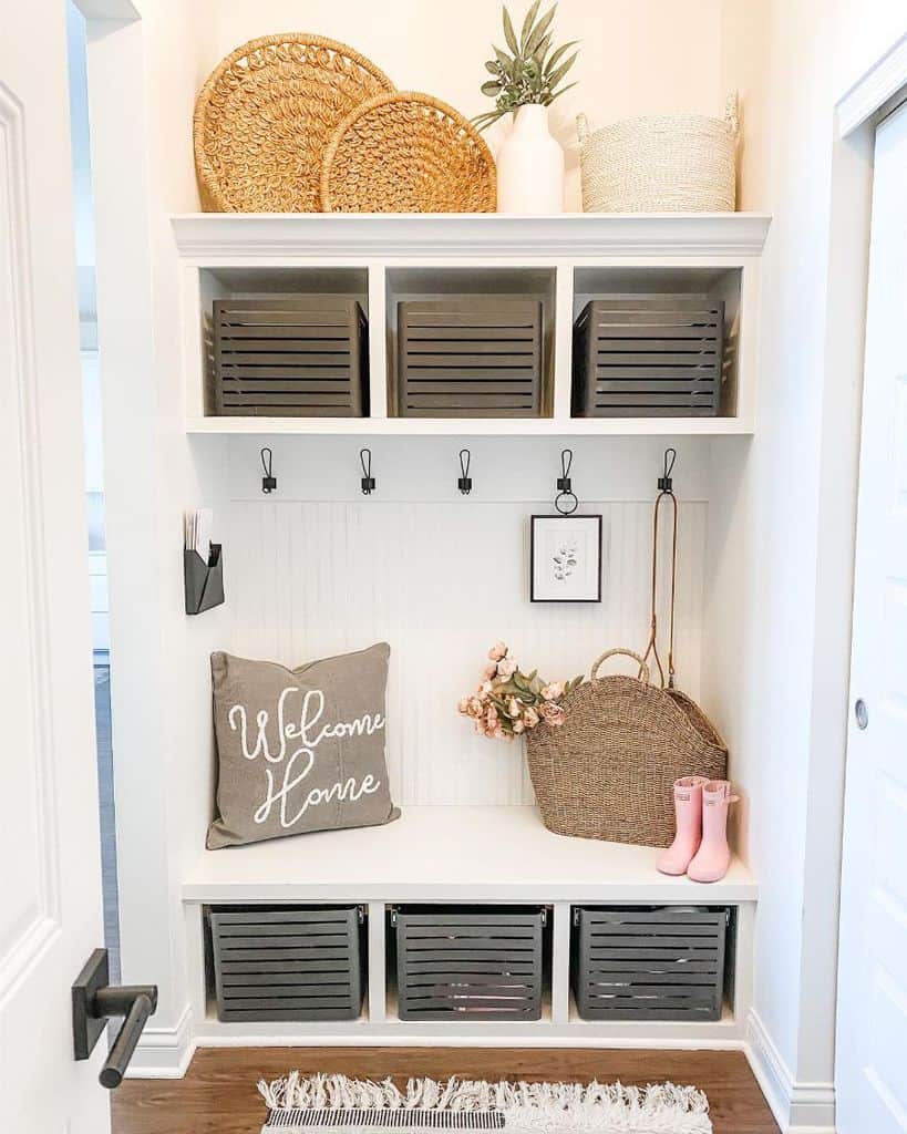 home mudroom with hook and wall storage 
