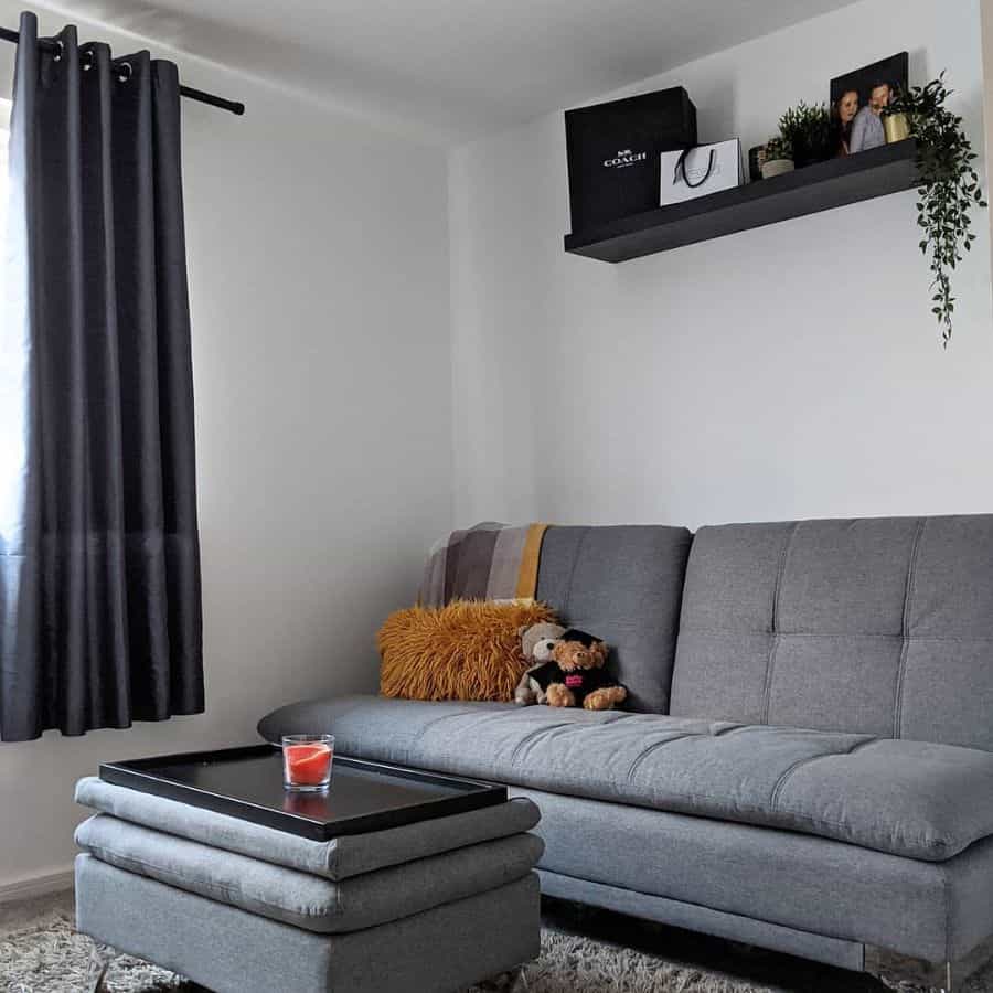 spare bedroom with gray sofa 