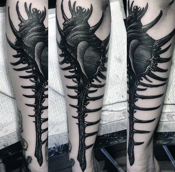 Murex Mens Seashell Tattoo On Leg With Black Ink Design