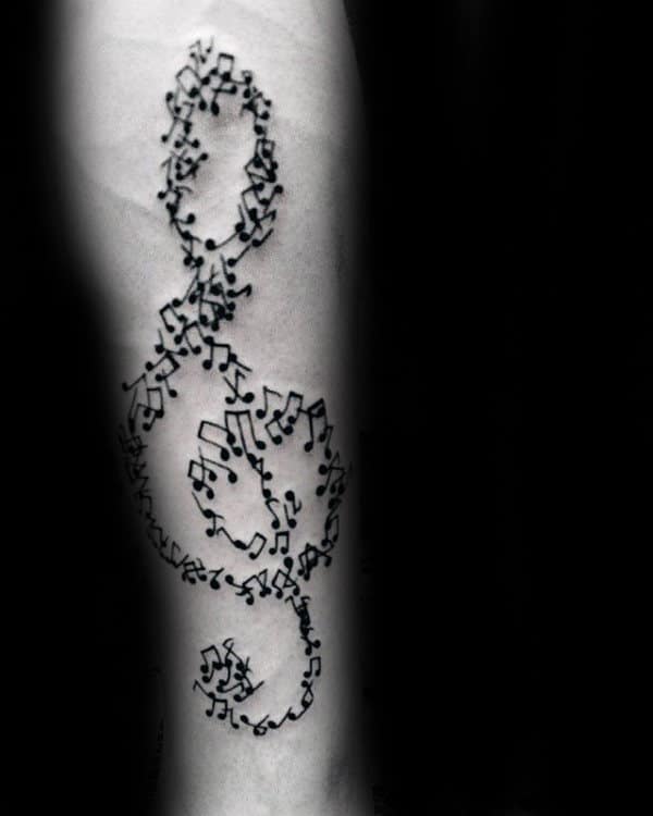 Music Note Forming Larger Music Note Male Forearm Tattoo
