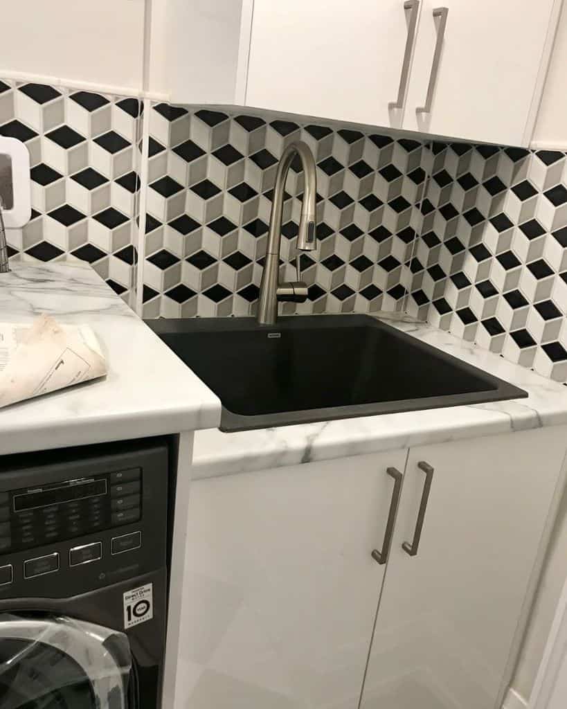 pattern tile backsplash laundry sink