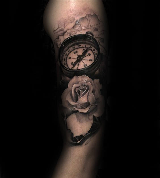 Natuical Map With Compass And Realistic White Rose Tattoo On Male