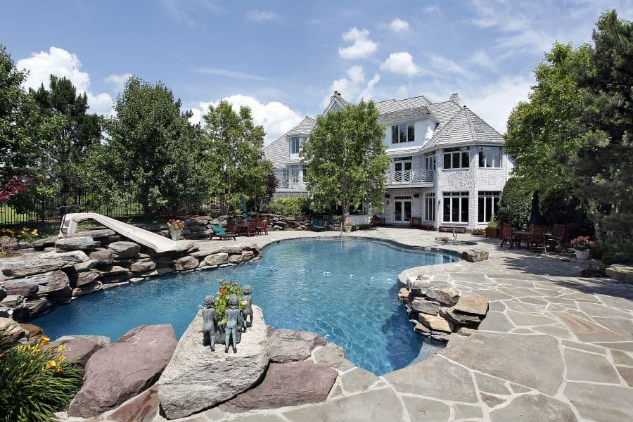 natural stone pavers pool deck with slide 