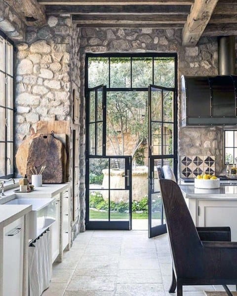 rustic kitchen stone walls open patio doorway