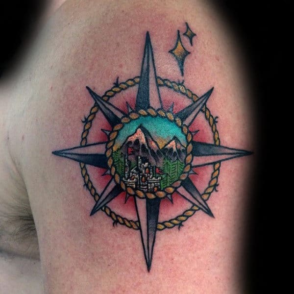 Nautical Star With Mountain Scene Mens Upper Arm Tattoo