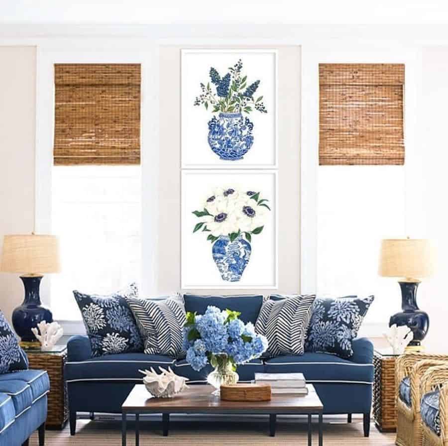 country style living room blue couch floral wall art