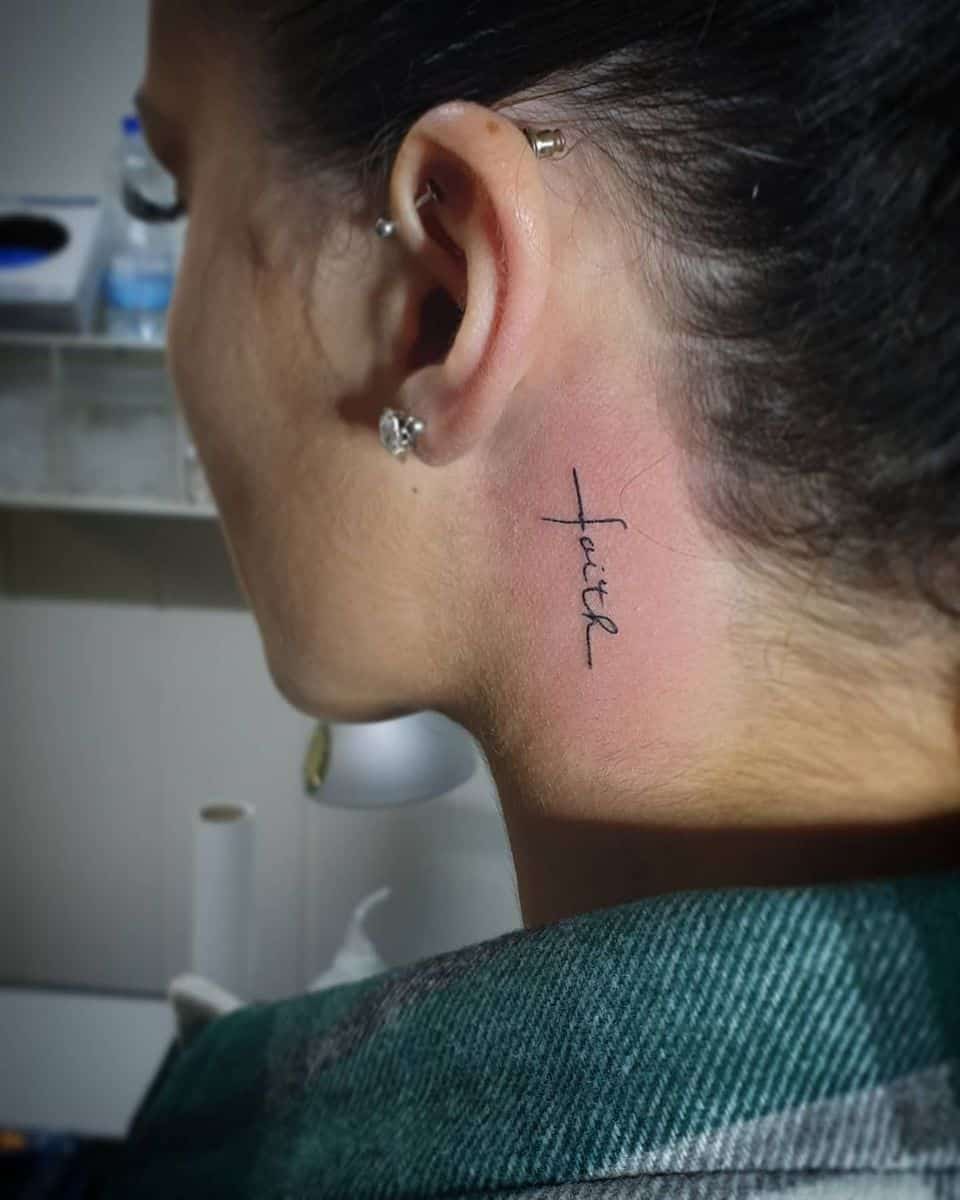 neck faith cross tattoo swizzink