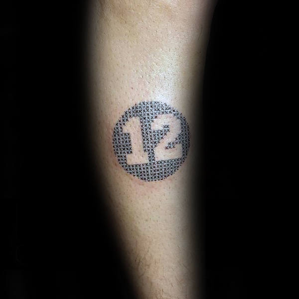 Negative Space Circle Pattern Guys Number 12 Tattoo On Forearm