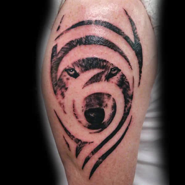 negative-space-male-tribal-wolf-tattoos-on-arm
