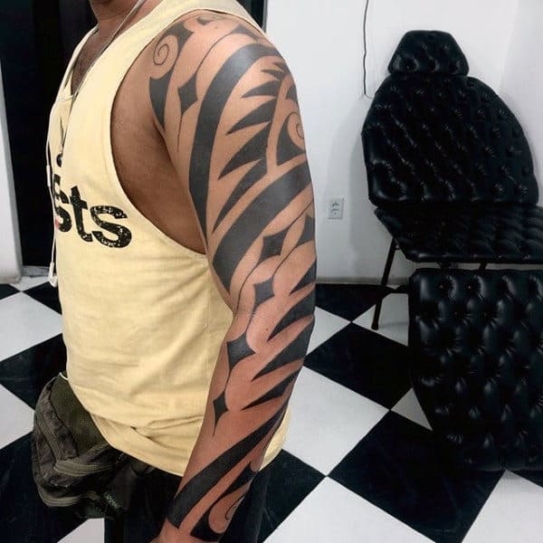 Negative Space Mens Tribal Sleeve Tattoos
