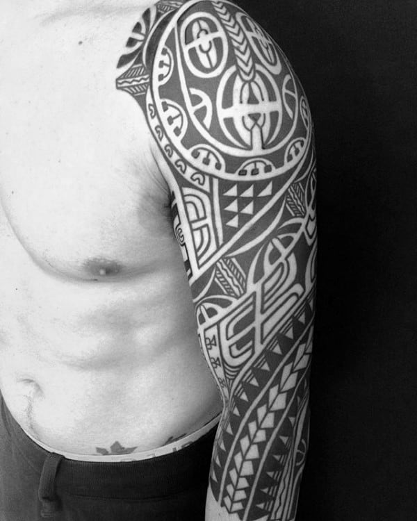Negative Space Pattern Hawaiian Half Sleeve Tribal Tattoo Ideas For Men