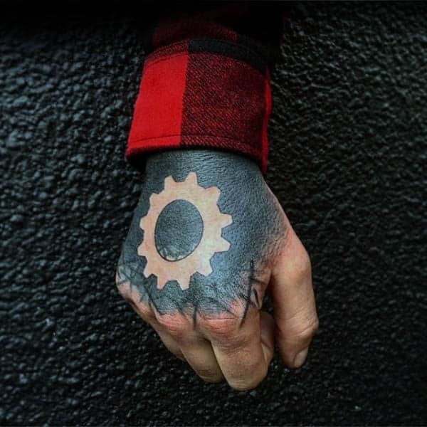 Negative Space Silhouette Mens Mechanical Gear Hand Tattoo