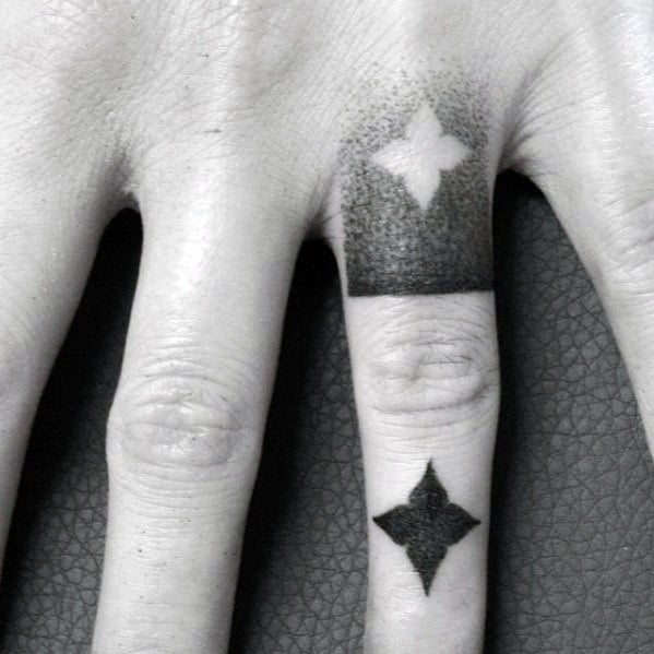 Negative Space Star Guys Dotwork Simple Geometric Finger Tattoo