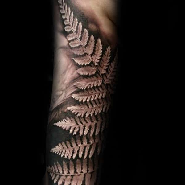 Negative Space White Ink Mens Fern Tattoo On Arm