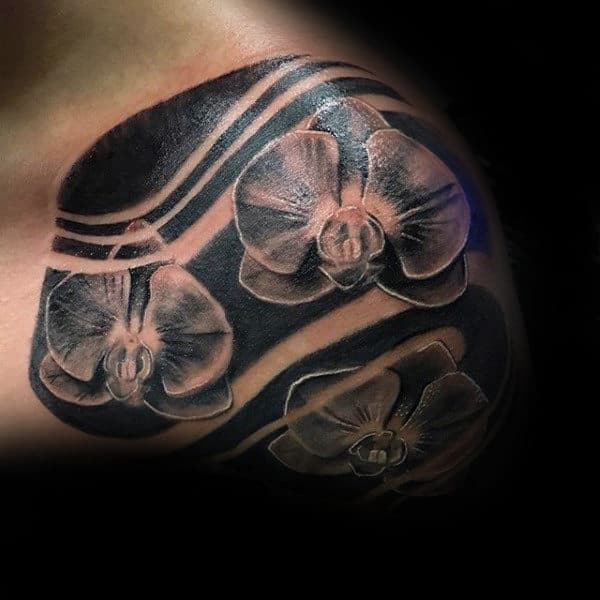 Negative Space Wind Orchid Mens Shoulder Tattoos