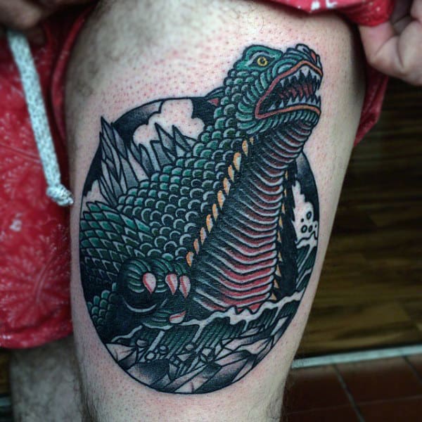 Neo Traditional Illustrative Tattoo Of Godzilla Coming Out Of Water On Mans Bicep
