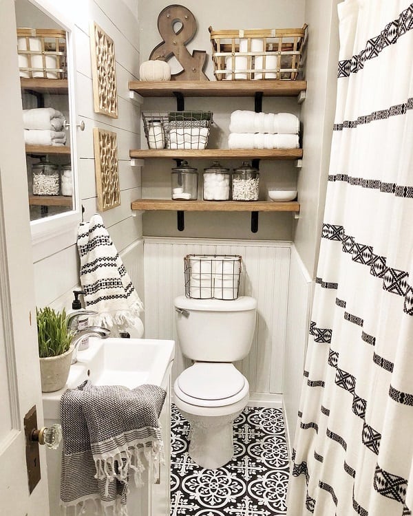 farmhouse bathroom with shiplap walls and pattern tile floor 