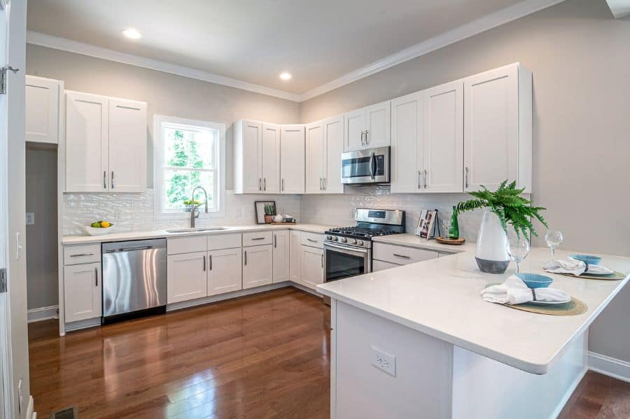 white cabinet kitchen wood vinyl flooring 