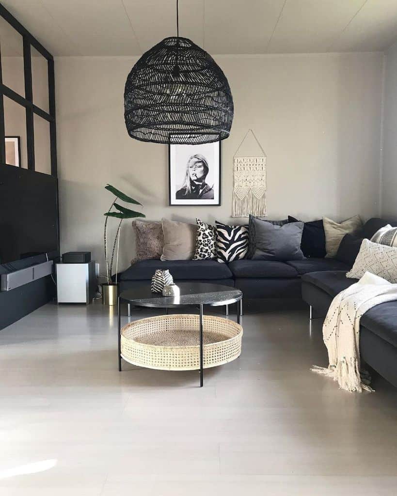 small contemporary living room with dark sofa 