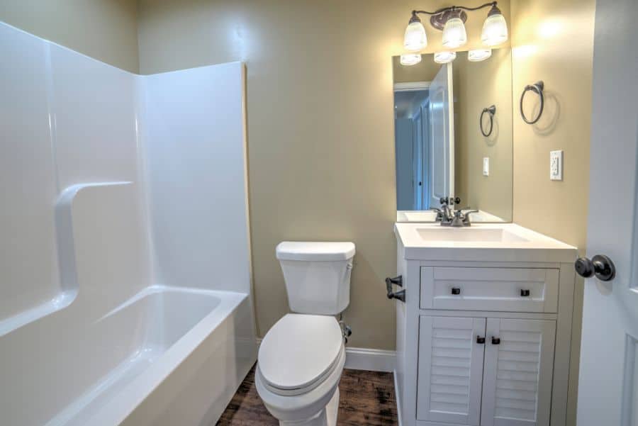 small neutral bathroom with white vanity 