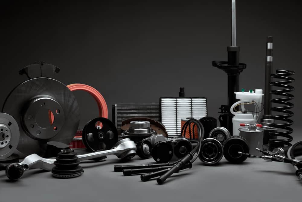 new car parts on a gray background closeup
