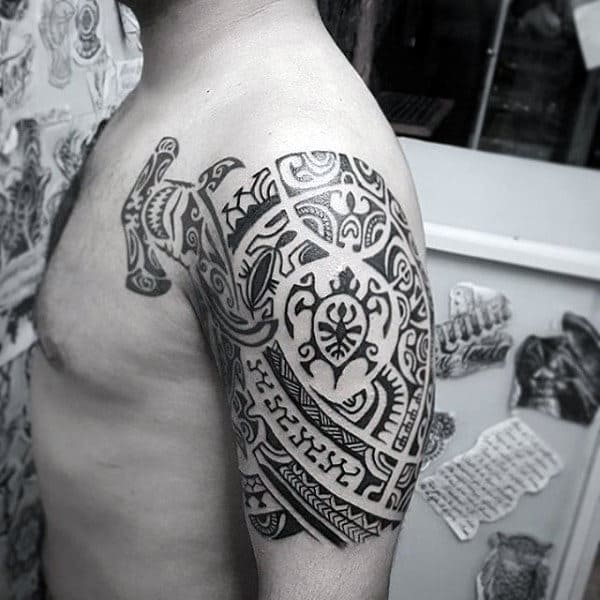 New Zealand Maori Mens Upper Arm Tattoo