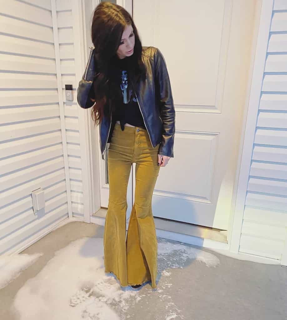 leather jacket with yellow pants country outfit