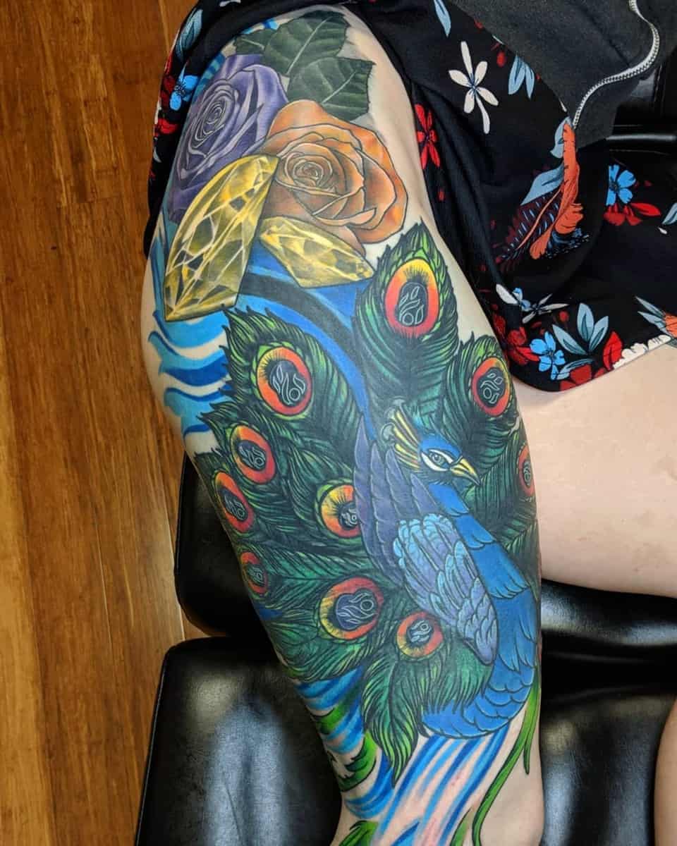 61 Beautiful Peacock Tattoo Pictures and Designs
