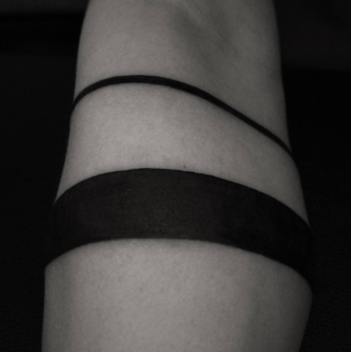 Schwarzes Armband-Tattoo
