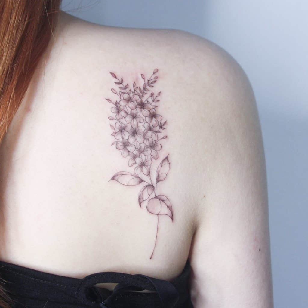 16 Mesmerizing Lilac Tattoo Designs To Celebrate Spring  TattooBloq  Lilac  tattoo Flower tattoo designs Tattoo designs