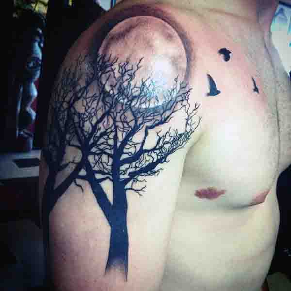 Night Moon With Trees Mens Upper Arm Tattoo In Black Ink