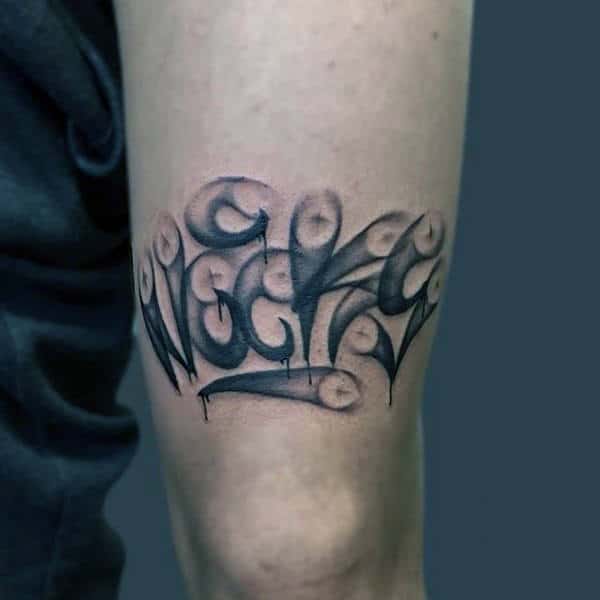 Nozzle Lettering Graffiti Tattoos For Men On Back Of Arm