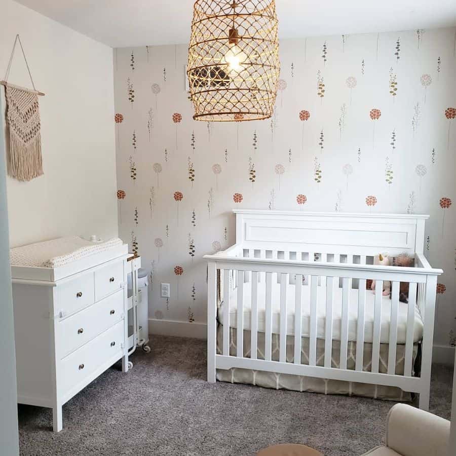 simple nursery floral wallpaper white crib dresser 