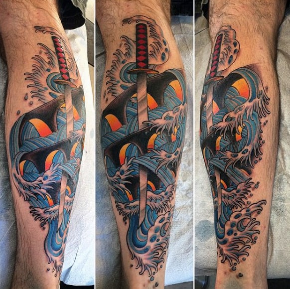 Ocean Blue Mens Skull And Sword Tattoo