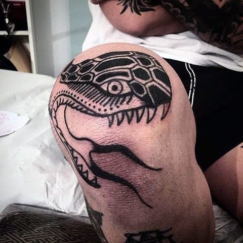 Old School Black Ink Outline Knee Snake Tattoo On Man