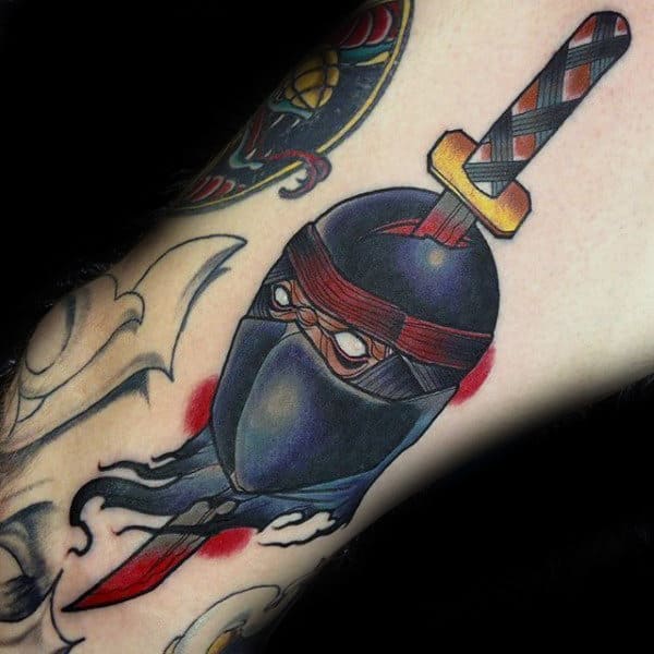 Old School Mens Ninja With Sword Through Head Tattoo Design On Arm