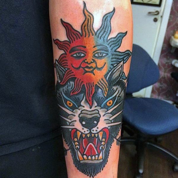 Old School Sun And Wolf Guys Tattoo On Forearm