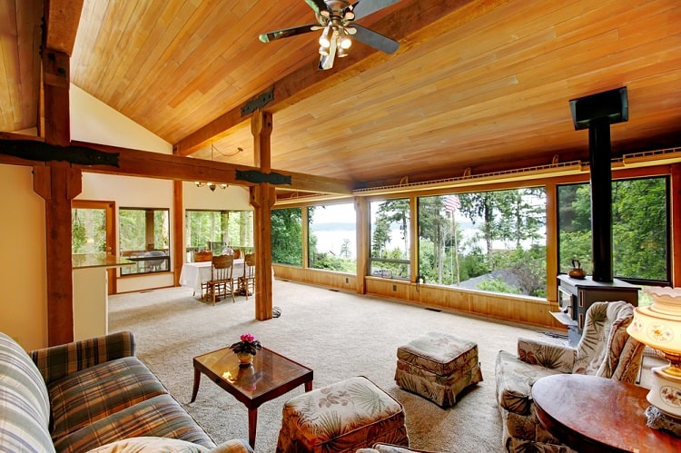 open floor plan cabin wood ceiling