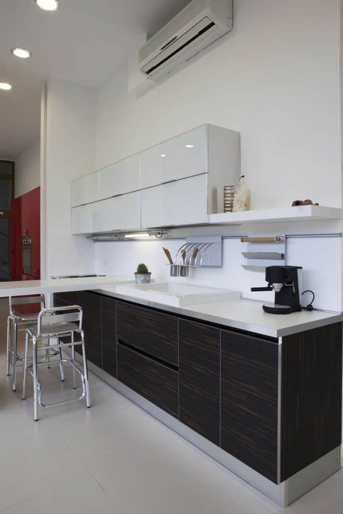 white kitchen black cabinet white tile