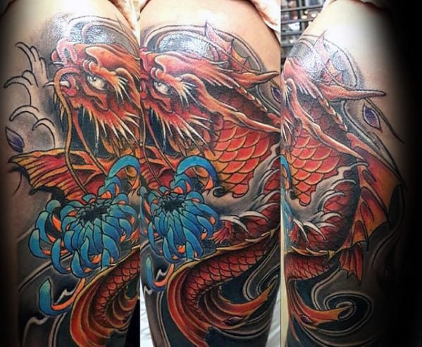 Orange Koi Dragon With Blue Flower Guys Arm Tattoo