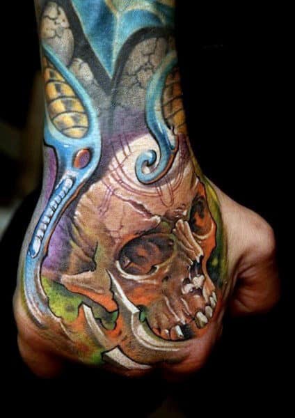 Orange Skull Mens Colorful Hand Tattoo Ideas