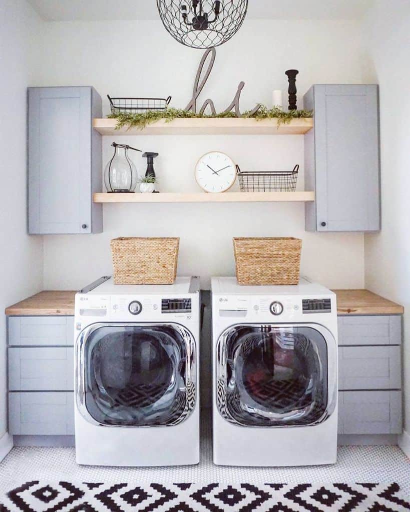gray cabinet organized laundry room washer and dryer