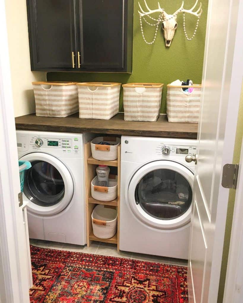 green wall laundry room basket storage washer and dryer