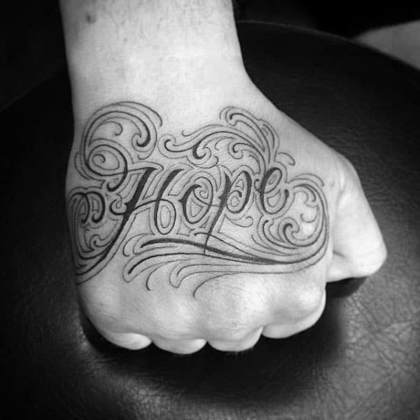 Ornate Male Hope Crusive Hand Tattoo Designs