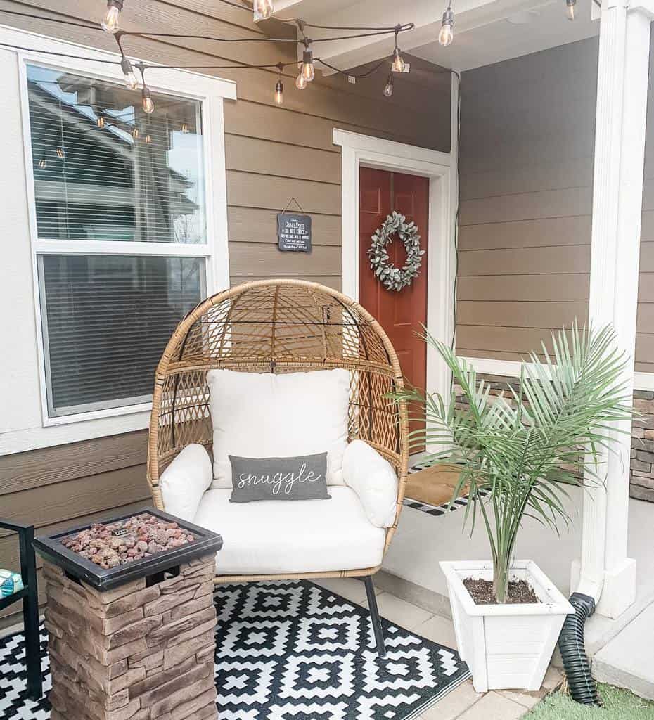 small front yard porch with seat and fire pit 